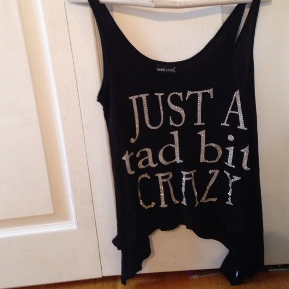 black flowy shirt "just a tad bit crazy"