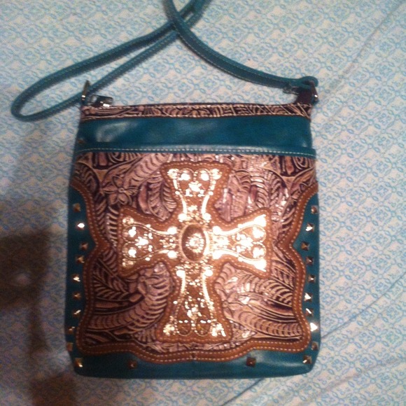Turquoise with silver cross purse.