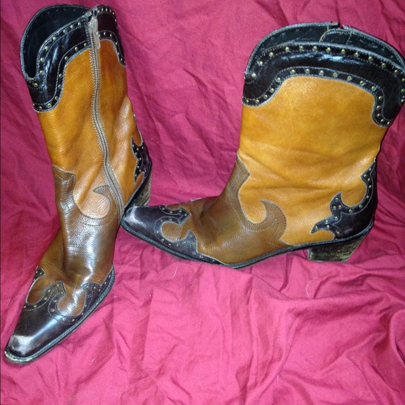 Stuart Weitzman three color cowboy boots.
