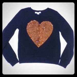 Black pullover with sequence heart