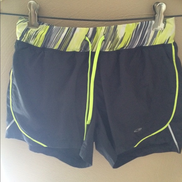 Green and black sport shorts
