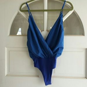Blue open back bodysuit