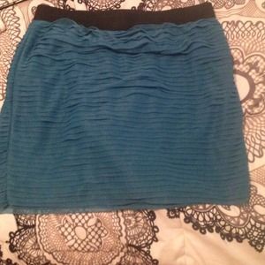 Tight blue ruffled skirt, looks great on anyone!