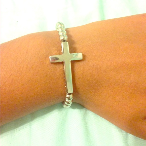 A cross silver bracket!!