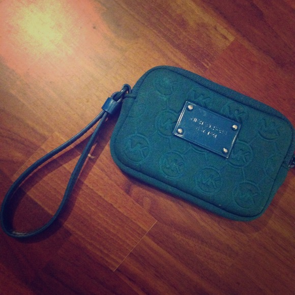 Michael Kors™ wristlet.