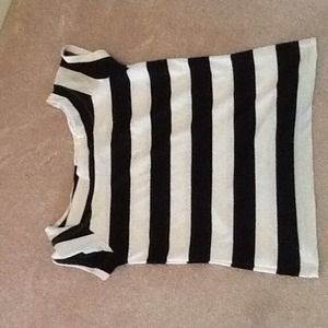 Classic black & white polyester shirt. Too tight