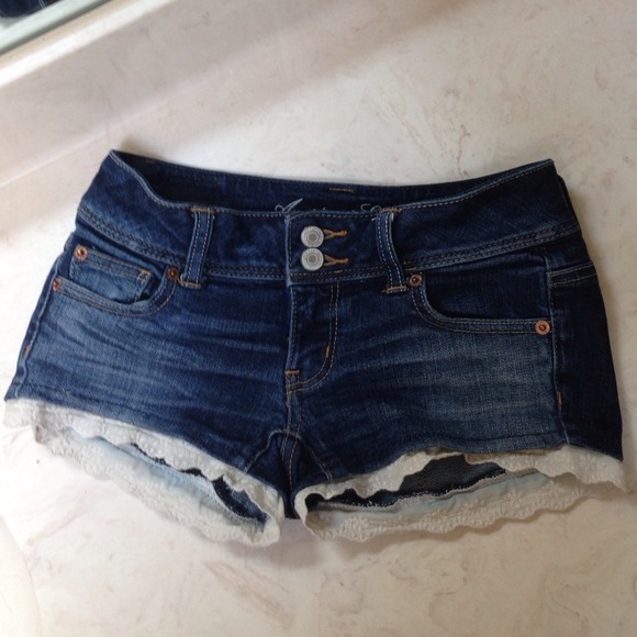 Denim low cut shorts with white ruffles