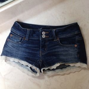 Denim low cut shorts with white ruffles