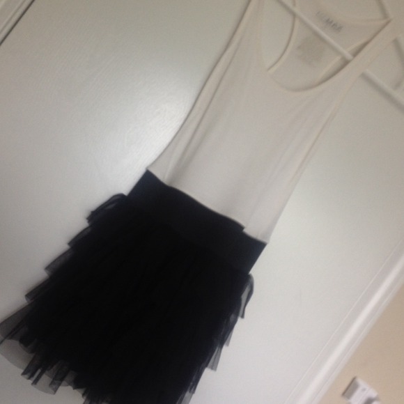 White tight fitted top,  black tutu dress