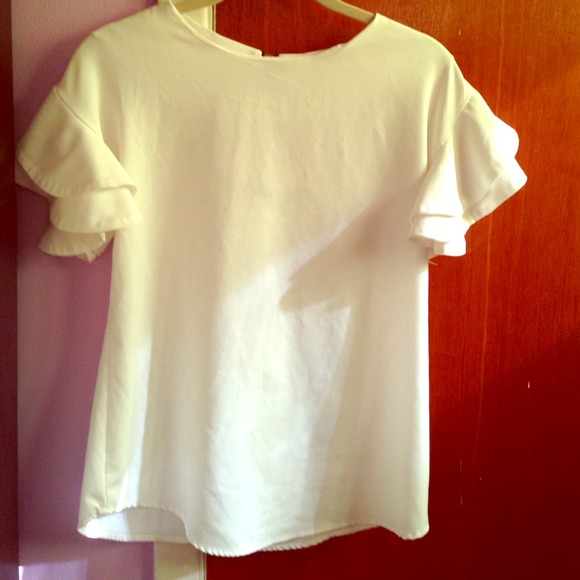 Ruffled white top