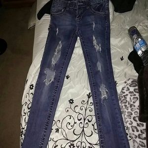 Premiere ripped and torn jeans