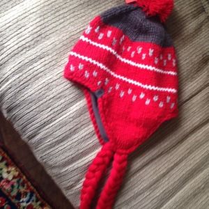 North face kids hat with braids  & top tassel