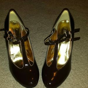 Brown patent leather shoes. Only worn once.