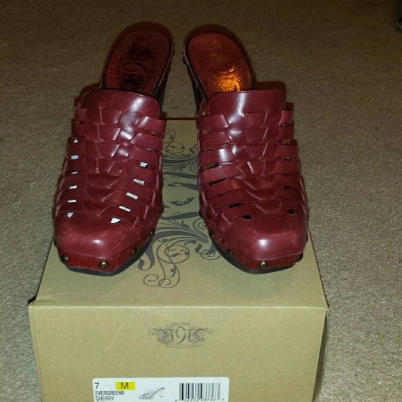 Nine West red clogs