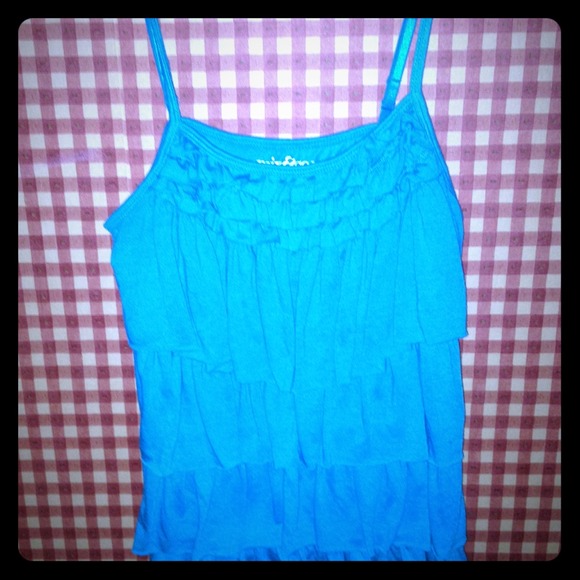 Turquoise tank, polka dot dress sequence skirt.