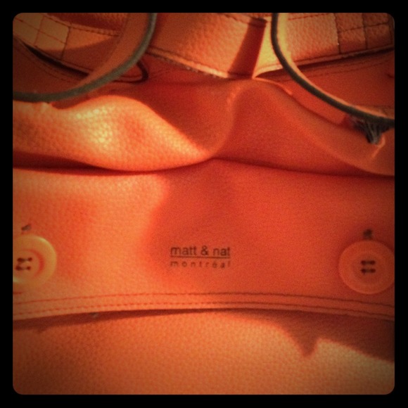 Orange purse with small straps