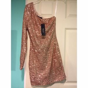 A beautiful one shoulder dress from Ark & Co.