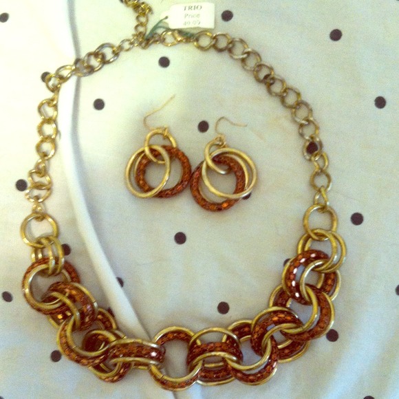 Gold and copper statement necklace and earrings