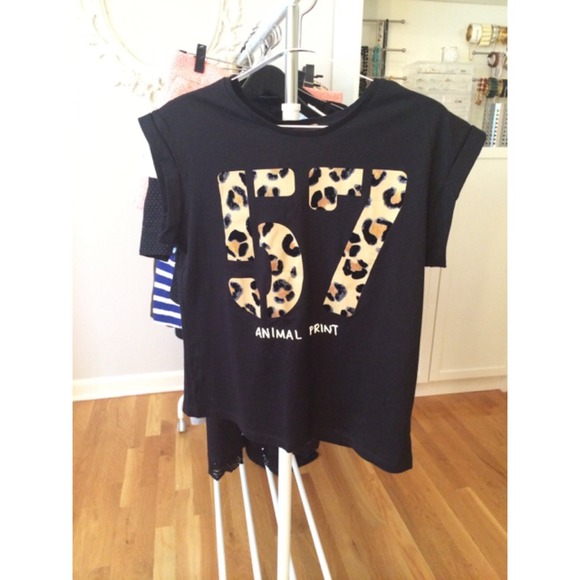 Zara. Black tee with animal print numbers