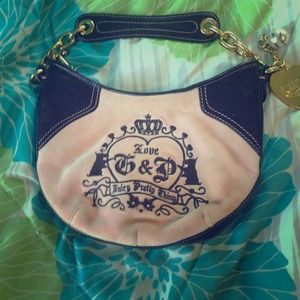 It is a pink purse from juicy couture