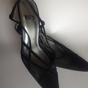 Black Stuart Weitzman dress heels.