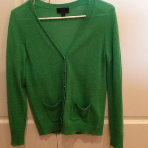 Fine wool sweater is happy emerald green