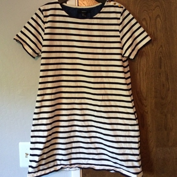Cute striped dress with shoulder embellishments!