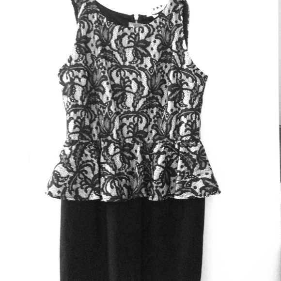 Super cute black and white peplum dress