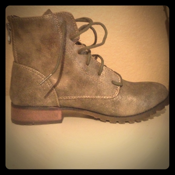 Silver shiny boots.