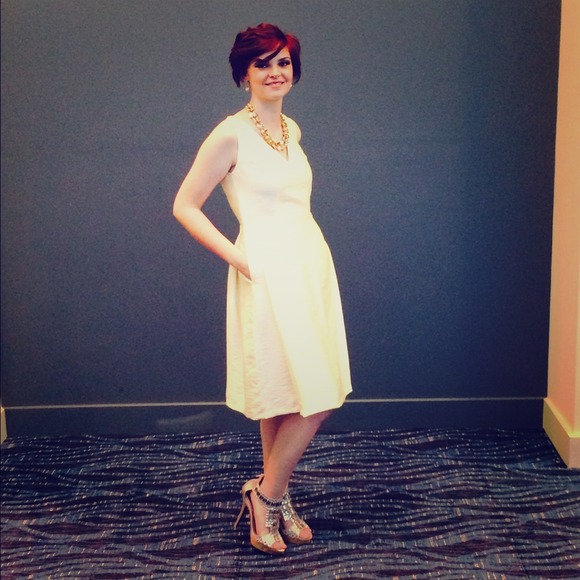 Beautiful ivory pleated dress by Love R.O.C.S.