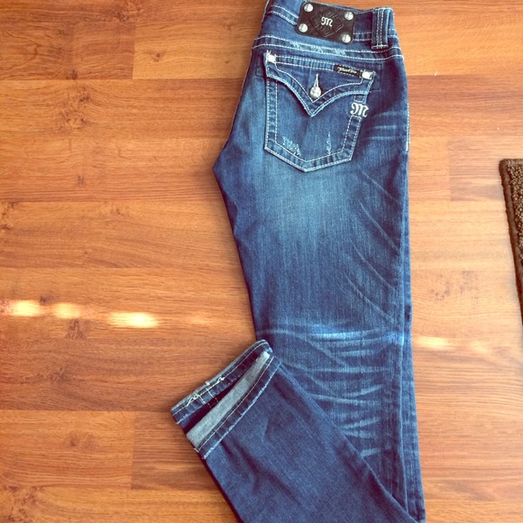 Miss Me's skinny leg.