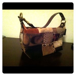 Small patchwork coach purse