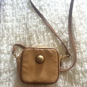 Cute and small brown vegan leather bag
