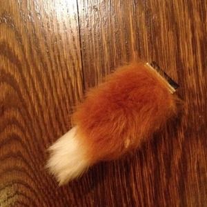 Fuzzy iphone fox tail accessory