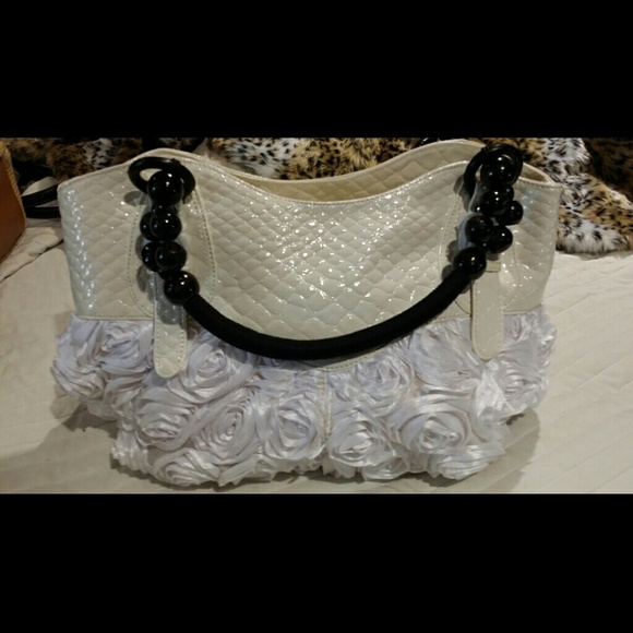 Beautiful white silky handbag.