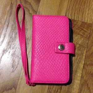 BCBGENERATION iPhone 5 hot pink wristlet.