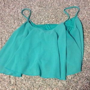 teal green crop top . worn once ! size large