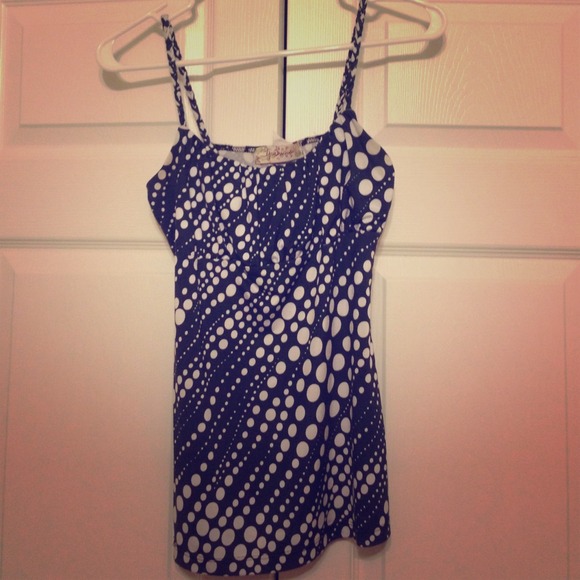 Dark blue with white polka dotted tank.