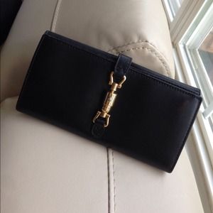 GUCCI black bi fold continental wallet