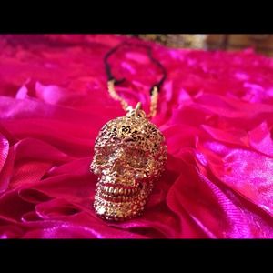 Disney Couture Pirates of the Caribbean Gold Skull