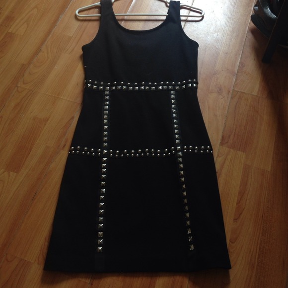 Black dress... Silver studs ..