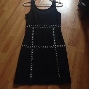 Black dress... Silver studs ..