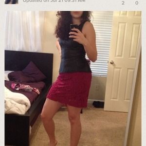 Leather and nylon peplum top