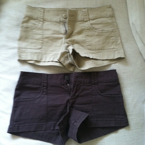 Reduced:2 pairs of shorts brown and khaki colored.