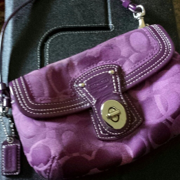 Purple signature Coach wristlet