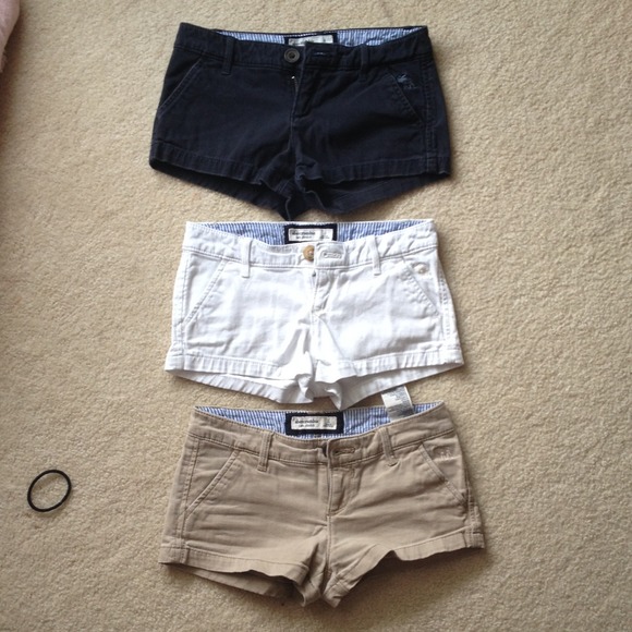 navy blue, kaki, and white shorts