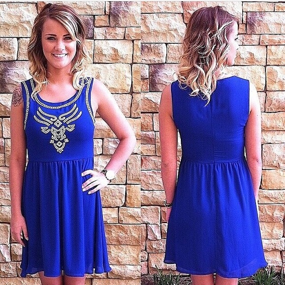 Royal blue dress with neon embroidered accent.