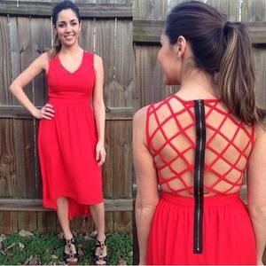 Red high-low dress with caged back.