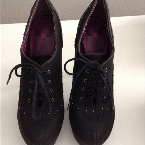 Black high heeled ankle botties