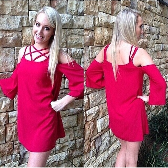 Red dress with strap accent.